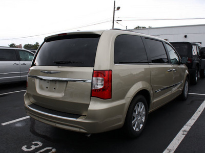 chrysler town and country 2012 gold van touring l flex fuel 6 cylinders front wheel drive automatic 07730