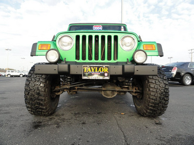 jeep wrangler 2004 green suv sport gasoline 6 cylinders 4 wheel drive 5 speed manual 60915