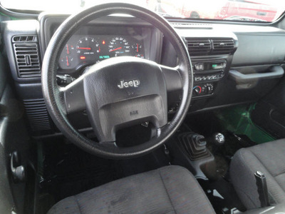 jeep wrangler 2004 green suv sport gasoline 6 cylinders 4 wheel drive 5 speed manual 60915