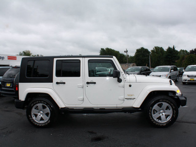 jeep wrangler unlimited 2010 white suv sahara gasoline 6 cylinders 4 wheel drive automatic with overdrive 07730