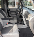 jeep wrangler unlimited 2010 black suv sahara gasoline 6 cylinders 4 wheel drive automatic 76210
