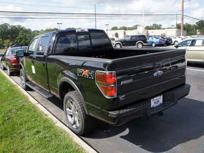 ford f 150 2011 black fx4 gasoline 6 cylinders 4 wheel drive automatic with overdrive 08753