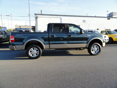 ford f 150 2004 dk green lariat gasoline 8 cylinders 4 wheel drive automatic 60915