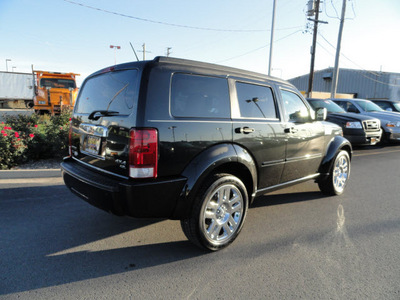 dodge nitro 2008 black suv r t gasoline 6 cylinders 4 wheel drive automatic 60915