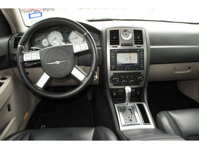 chrysler 300c srt 8 2006 black sedan gasoline 8 cylinders rear wheel drive automatic 77388