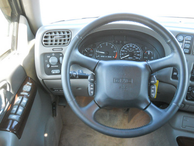 gmc envoy 1999 black suv slt gasoline v6 4 wheel drive automatic 55811