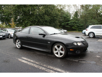 pontiac gto 2006 phantom black coupe gasoline 8 cylinders rear wheel drive 6 speed manual 07712