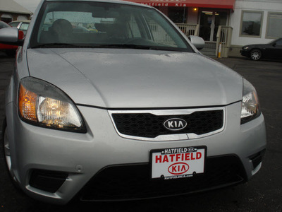 kia rio 2010 silver sedan lx gasoline 4 cylinders front wheel drive automatic with overdrive 43228