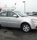 kia rio 2010 silver sedan lx gasoline 4 cylinders front wheel drive automatic with overdrive 43228