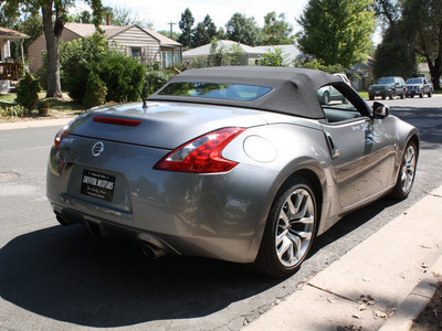 nissan 370z 2010 silver coupe roadster gasoline 6 cylinders rear wheel drive 6 speed manual 80110