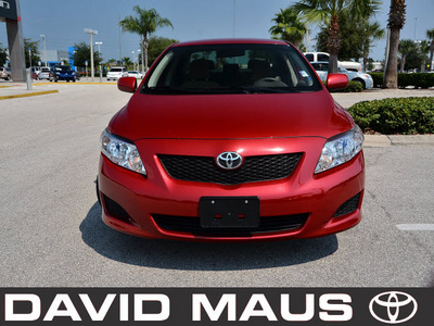 toyota corolla 2009 red sedan le gasoline 4 cylinders front wheel drive automatic 32771