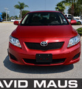 toyota corolla 2009 red sedan le gasoline 4 cylinders front wheel drive automatic 32771