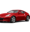 nissan 370z 2011 red coupe gasoline 6 cylinders rear wheel drive not specified 98371