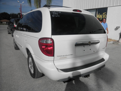 chrysler town and country 2005 white van signature series gasoline 6 cylinders front wheel drive automatic 34731