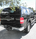 ford f 150 2005 black pickup truck lariat 8 cylinders 4 wheel drive automatic 32783