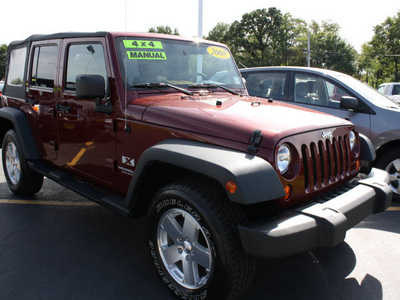jeep wrangler unlimited 2008 dk  red suv x gasoline 6 cylinders 4 wheel drive 6 speed manual 07730