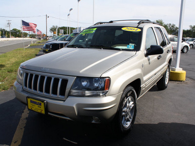 jeep grand cherokee 2004 tan suv special edition gasoline 6 cylinders 4 wheel drive automatic with overdrive 07730