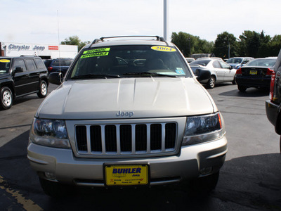 jeep grand cherokee 2004 tan suv special edition gasoline 6 cylinders 4 wheel drive automatic with overdrive 07730