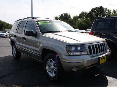 jeep grand cherokee 2004 tan suv special edition gasoline 6 cylinders 4 wheel drive automatic with overdrive 07730