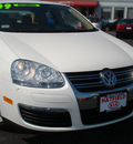 volkswagen jetta 2009 white sedan gasoline 5 cylinders front wheel drive automatic 43228