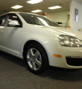 volkswagen jetta 2009 white sedan s gasoline 5 cylinders front wheel drive 5 speed manual 34474