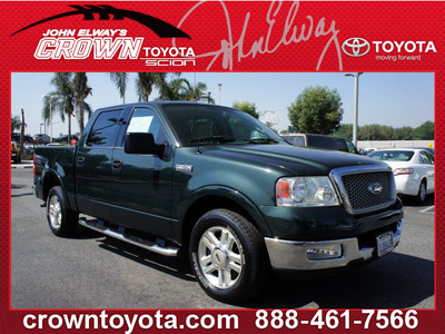 ford f 150 2004 green pickup truck supercrew lariat gasoline 8 cylinders rear wheel drive automatic 91761