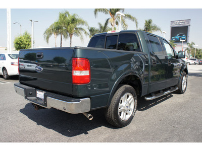 ford f 150 2004 green pickup truck supercrew lariat gasoline 8 cylinders rear wheel drive automatic 91761