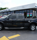 ford f 150 2010 black pickup truck stx gasoline 8 cylinders 2 wheel drive automatic 33021