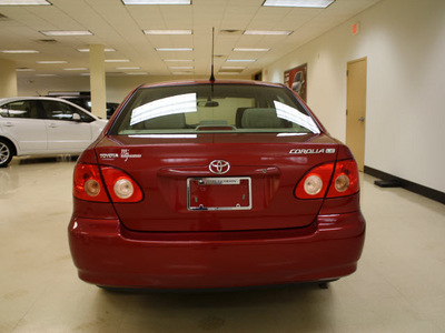 toyota corolla 2007 red sedan le gasoline 4 cylinders front wheel drive 5 speed manual 27707