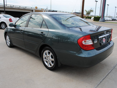 toyota camry 2004 dk  green sedan le gasoline 4 cylinders front wheel drive automatic 75228