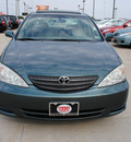 toyota camry 2004 dk  green sedan le gasoline 4 cylinders front wheel drive automatic 75228