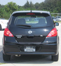 nissan versa 2011 black hatchback sl gasoline 4 cylinders front wheel drive automatic 33884