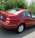 volkswagen jetta 2004 red sedan gls gasoline 4 cylinders front wheel drive 5 speed manual 98226