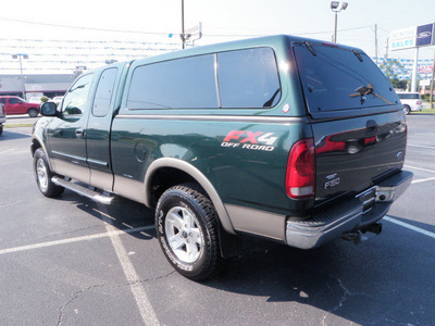 ford f 150 2002 dk  green lariat gasoline 8 cylinders 4 wheel drive automatic with overdrive 32401
