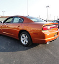 dodge charger 2011 orange sedan se gasoline 6 cylinders rear wheel drive shiftable automatic 60915