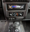 jeep wrangler 1999 black suv sport gasoline 6 cylinders 4 wheel drive 5 speed manual 98371
