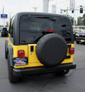 jeep wrangler 2004 yellow suv x gasoline 6 cylinders 4 wheel drive automatic with overdrive 98371