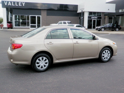 toyota corolla 2010 tan sedan le gasoline 4 cylinders front wheel drive automatic 55124