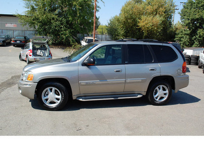 gmc envoy 2002 gray suv 4x4 slt gasoline 6 cylinders 4 wheel drive automatic 95678