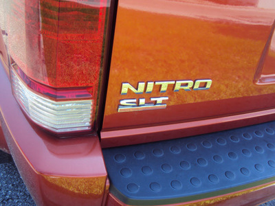 dodge nitro 2008 orange suv slt gasoline 6 cylinders rear wheel drive automatic 32901