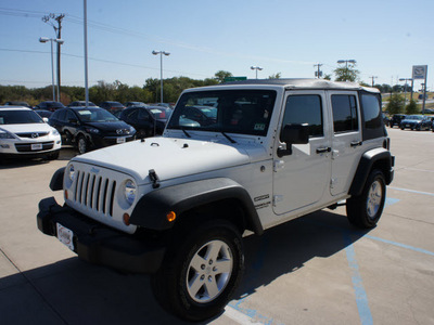 jeep wrangler unlimited 2010 white suv sport gasoline 6 cylinders 4 wheel drive manual 76210