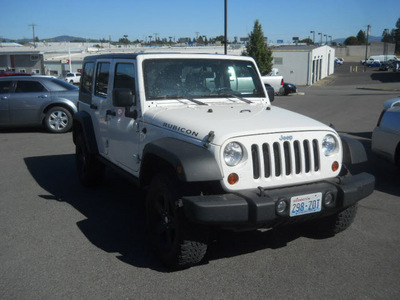 jeep wrangler unlimited 2009 white suv rubicon gasoline 6 cylinders 4 wheel drive 6 speed manual 99212