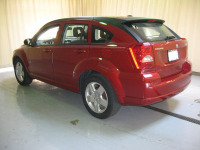 dodge caliber 2009 red hatchback sxt gasoline 4 cylinders front wheel drive automatic 44883