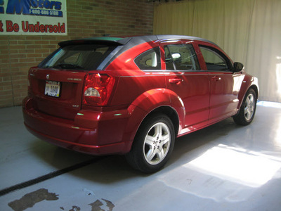 dodge caliber 2009 red hatchback sxt gasoline 4 cylinders front wheel drive automatic 44883