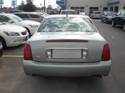 cadillac deville 2005 green sedan gasoline 8 cylinders front wheel drive automatic with overdrive 13502