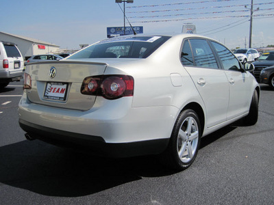 volkswagen jetta 2010 gold sedan limited edition pzev gasoline 5 cylinders front wheel drive automatic 46410