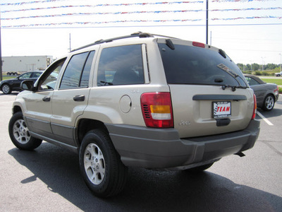 jeep grand cherokee 2000 off white suv laredo gasoline 6 cylinders 4 wheel drive automatic with overdrive 46410