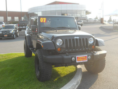 jeep wrangler 2007 black suv sahara gasoline 6 cylinders 4 wheel drive 6 speed manual 99212