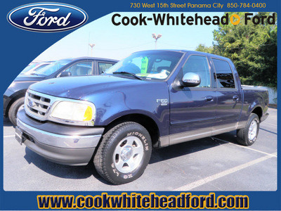 ford f 150 2002 blue xlt gasoline 8 cylinders rear wheel drive automatic with overdrive 32401
