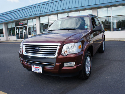 ford explorer 2010 brown suv xlt gasoline 6 cylinders 4 wheel drive automatic with overdrive 08753